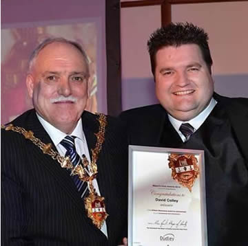 Dave Colley recieives the award